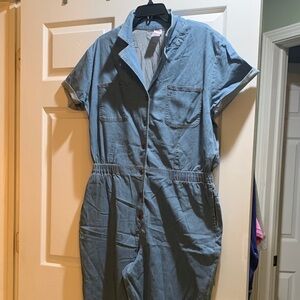 No Boundaries Light Blue Denim jumpsuit with 2 front & 2 side pockets.